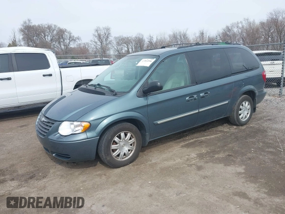 2005 Chrysler Town & Country Touring with VIN 2C4GP54LX5R202644, listed as a IAAI auction lot 41864996 with 161,645 mi miles. Bid and sale history available at carsss.com. Image 17.