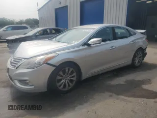 2013 Hyundai Azera с VIN KMHFG4JG5DA204636, выставлен на аукционе Copart как лот 59782945 с пробегом 74 494 миль миль и Списание • Salvage title. История ставок и продаж доступна на DreamBid. Изображение 1.