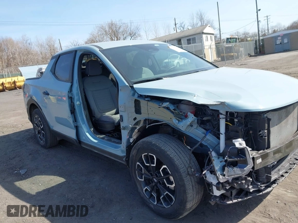 2024 Hyundai Santa Cruz SEL z VIN 5NTJBDAE3RH088530, wystawiony jako IAAI lot #41785149 z przebiegiem 21 560 mil mil oraz . Historia ofert i sprzedaży dostępna na DreamBid. Obrazek 17.