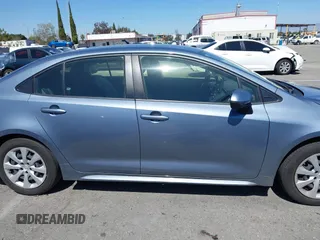 2022 Toyota Corolla LE with VIN JTDEPMAEXN3023746, listed as a IAAI auction lot 41838942 with 15,502 mi miles. Bid and sale history available at carsss.com. Image 13.