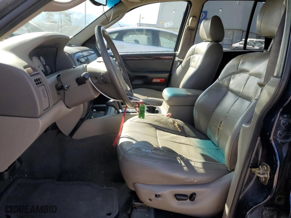 2004 Jeep Grand Cherokee Limited with VIN 1J4GW58S54C166433, listed as a Copart auction lot 71649454 with 174,603 mi miles and Salvage Title. Bid and sale history available at carsss.com. Image 7.