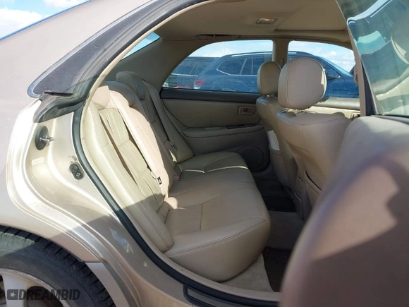 2000 Lexus ES 300 with VIN JT8BF28G1Y5099039, listed as a IAAI auction lot 41702348 with 229,398 mi miles. Bid and sale history available at carsss.com. Image 8.