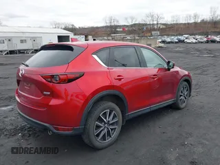 2018 Mazda CX-5 Grand Touring with VIN JM3KFBDM0J0427753, listed as a IAAI auction lot 41740838 with 69,683 mi miles and . Bid and sale history available at DreamBid. Image 4.