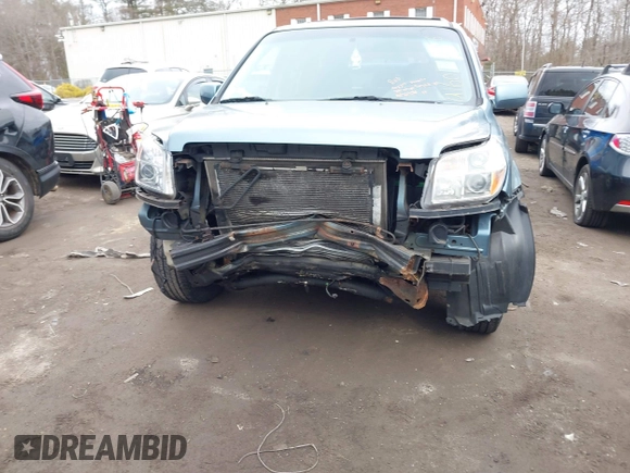 2006 Honda Pilot EX with VIN 5FNYF28436B013517, listed as a IAAI auction lot 41607406 with 235,561 mi miles and . Bid and sale history available at DreamBid. Image 6.