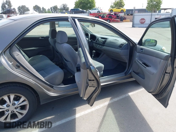 2005 Toyota Camry LE with VIN 4T1BF32K35U590150, listed as a IAAI auction lot 42053337 with 180,627 mi miles and . Bid and sale history available at DreamBid. Image 8.
