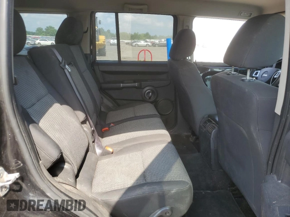 2009 Jeep Commander Sport z VIN 1J8HG48K39C501268, wystawiony jako Copart lot #64312325 z przebiegiem 184 794 mil mil oraz Szkoda całkowita • Salvage title. Historia ofert i sprzedaży dostępna na DreamBid. Obrazek 11.