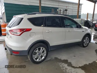 2013 Ford Escape SEL с VIN 1FMCU0H91DUB90163, выставлен на аукционе Copart как лот 64091785 с пробегом 156 038 миль миль и Списание • Salvage title. История ставок и продаж доступна на DreamBid. Изображение 3.