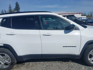 2023 Jeep Compass Latitude with VIN 3C4NJDBN7PT561666, listed as a IAAI auction lot 41956815 with 49,392 mi miles and . Bid and sale history available at DreamBid. Image 13.