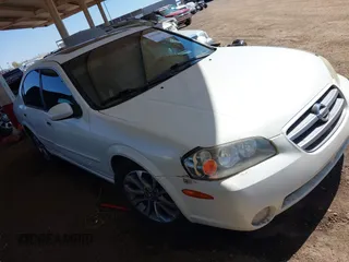 2002 Nissan Maxima GLE z VIN JN1DA31A92T310093, wystawiony jako IAAI lot #41842486 z przebiegiem 228 329 mil mil oraz . Historia ofert i sprzedaży dostępna na DreamBid. Obrazek 1.