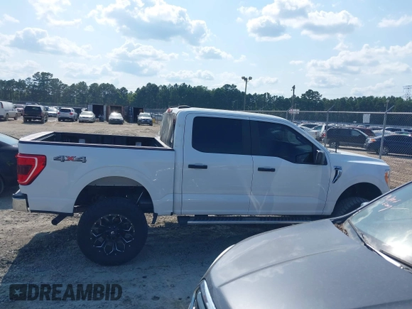 2022 Ford F-150 XL with VIN 1FTFW1E57NFB47648, listed as a IAAI auction lot 42587449 with 38,149 mi miles and . Bid and sale history available at DreamBid. Image 13.