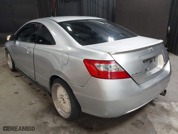 2007 Honda Civic Cpe LX with VIN 2HGFG11647H514388, listed as a IAAI auction lot 41581403 with 140,669 mi miles. Bid and sale history available at carsss.com. Image 3.