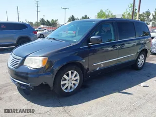 2014 Chrysler Town & Country Touring with VIN 2C4RC1BGXER221486, listed as a IAAI auction lot 41990508 with 142,749 mi miles. Bid and sale history available at carsss.com. Image 2.