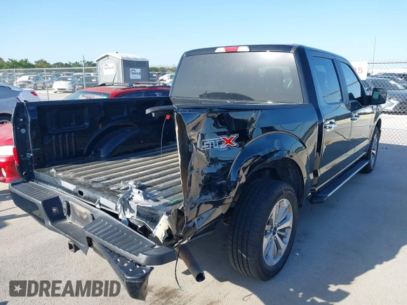 2018 Ford F-150 XL with VIN 1FTEW1C58JKC02382, listed as a IAAI auction lot 42010568 with 124,757 mi miles and . Bid and sale history available at DreamBid. Image 4.
