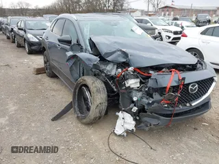 2021 Mazda CX-30 Premium with VIN 3MVDMBDY9MM241042, listed as a IAAI auction lot 41746326 with Not Provided miles and . Bid and sale history available at carsss.com. Image 1.