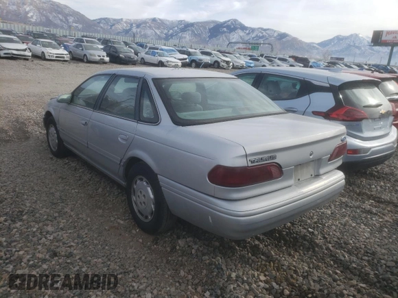 1995 Ford Taurus GL with VIN 1FALP52U5SA320424, listed as a Copart auction lot 83676194 with 177,817 mi miles and Salvage title. Bid and sale history available at DreamBid. Image 2.