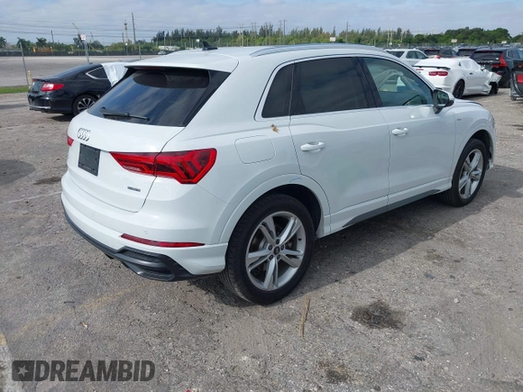 2022 Audi Q3 S line Premium Plus with VIN WA1EECF32N1065423, listed as a IAAI auction lot 42081354 with 27,071 mi miles and . Bid and sale history available at DreamBid. Image 4.