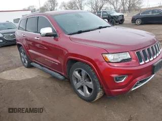 2014 Jeep Grand Cherokee Overland with VIN 1C4RJFCM0EC492833, listed as a IAAI auction lot 41836579 with 120,168 mi miles. Bid and sale history available at carsss.com. Image 1.