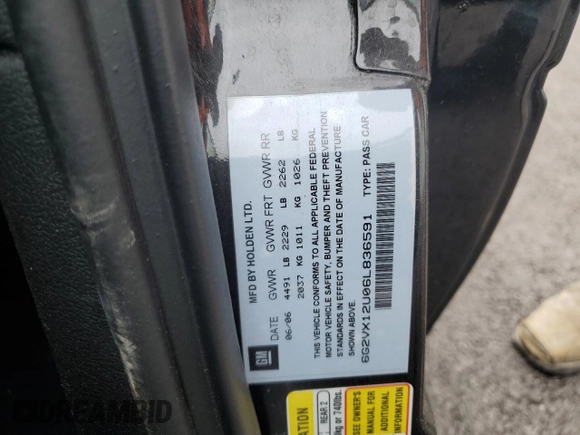 2006 Pontiac GTO z VIN 6G2VX12U06L836591, wystawiony jako Copart lot #51596625 z przebiegiem 61 758 mil mil oraz Szkoda całkowita • Salvage title. Historia ofert i sprzedaży dostępna na DreamBid. Obrazek 13.