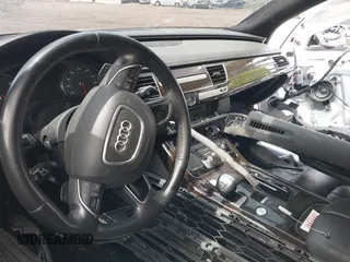 2015 Audi A8 4.0T z VIN WAU32AFD2FN038880, wystawiony jako IAAI lot #42138932 z przebiegiem 102 968 mil mil oraz . Historia ofert i sprzedaży dostępna na DreamBid. Obrazek 5.
