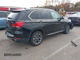 2016 BMW X5 sDrive35i with VIN 5UXKR2C59G0U17661, listed as a IAAI auction lot 40931088 with 90,963 mi miles. Bid and sale history available at carsss.com. Image 4.