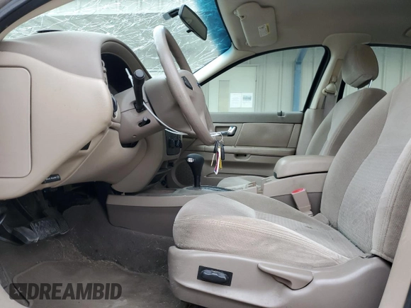 2003 Ford Taurus SE Standard with VIN 1FAFP53283G140539, listed as a Copart auction lot 53453665 with 97,227 mi miles and Salvage Title. Bid and sale history available at DreamBid. Image 7.