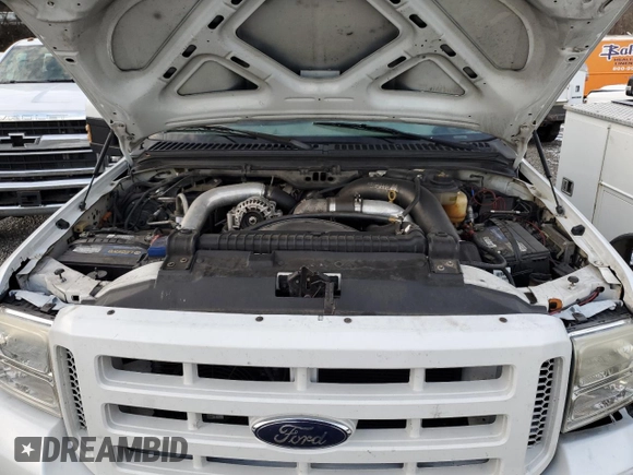 2007 Ford F-350 XL with VIN 1FTWF31P77EB13964, listed as a Copart auction lot 86046944 with 126,568 mi miles and Salvage title. Bid and sale history available at DreamBid. Image 7.