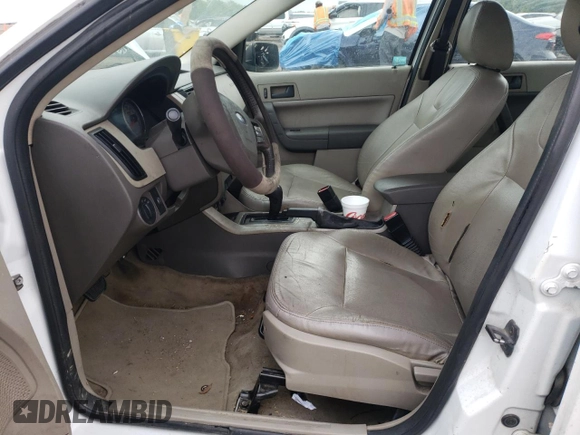 2008 Ford Focus SE with VIN 1FAHP35N58W297866, listed as a Copart auction lot 55307685 with 246,122 mi miles and Salvage Title. Bid and sale history available at DreamBid. Image 7.