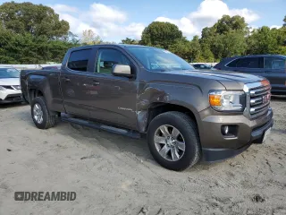 2016 GMC Canyon 4WD SLE with VIN 1GTG6CE38G1293670, listed as a Copart auction lot 72114774 with 125,659 mi miles and Salvage Title. Bid and sale history available at carsss.com. Image 4.