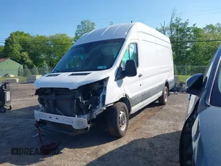 2021 Ford Transit Cargo z VIN 1FTBW3X84MKA60720, wystawiony jako IAAI lot #42202665 z przebiegiem 67 295 mil mil oraz . Historia ofert i sprzedaży dostępna na DreamBid. Obrazek 2.