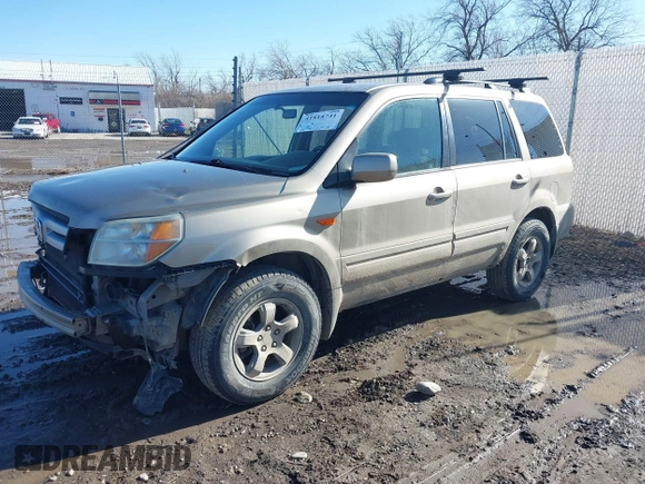 2007 Honda Pilot EX with VIN 2HKYF184X7H534943, listed as a IAAI auction lot 41818741 with 220,151 mi miles. Bid and sale history available at carsss.com. Image 2.