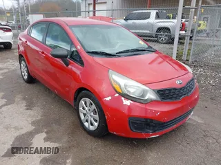 2013 Kia Rio LX with VIN KNADM4A34D6310495, listed as a IAAI auction lot 41986664 with 129,145 mi miles. Bid and sale history available at carsss.com. Image 1.