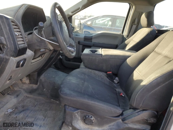 2019 Ford F-150 XL with VIN 1FTMF1C50KKC79325, listed as a Copart auction lot 84731164 with 100,643 mi miles and Salvage Title. Bid and sale history available at carsss.com. Image 7.