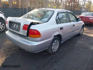 1996 Honda Civic LX "O" w/Air with VIN 2HGEJ6675TH506726, listed as a IAAI auction lot 41502910 with 250,045 mi miles. Bid and sale history available at carsss.com. Image 4.