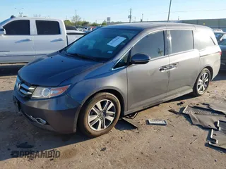 2016 Honda Odyssey Touring Elite with VIN 5FNRL5H98GB132255, listed as a IAAI auction lot 41839600 with 131,064 mi miles and . Bid and sale history available at DreamBid. Image 2.