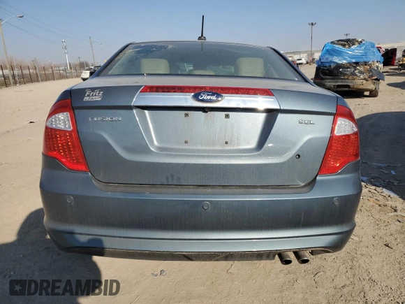 2012 Ford Fusion SEL z VIN 3FAHP0JAXCR192513, wystawiony jako Copart lot #48873205 z przebiegiem 163 110 mil mil oraz Szkoda całkowita • Salvage title. Historia ofert i sprzedaży dostępna na DreamBid. Obrazek 6.