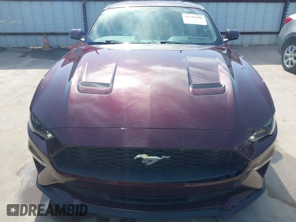 2018 Ford Mustang EcoBoost z VIN 1FA6P8TH3J5132136, wystawiony jako IAAI lot #41741496 z przebiegiem 62 526 mil mil oraz . Historia ofert i sprzedaży dostępna na DreamBid. Obrazek 13.