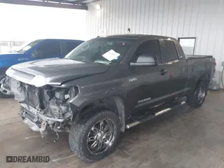 2014 Toyota Tundra 2WD Truck SR with VIN 5TFRY5F15EX166929, listed as a IAAI auction lot 41458810 with 142,152 mi miles. Bid and sale history available at carsss.com. Image 17.