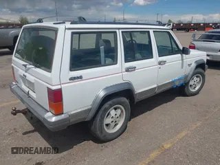 1992 Jeep Cherokee with VIN 1J4FJ58S0NL102716, listed as a IAAI auction lot 42169406 with 197,167 mi miles and . Bid and sale history available at DreamBid. Image 4.