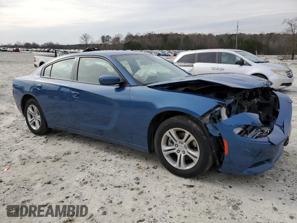 2021 Dodge Charger SXT with VIN 2C3CDXBGXMH587740, listed as a Copart auction lot 44844385 with 74,643 mi miles and Salvage Title. Bid and sale history available at carsss.com. Image 4.