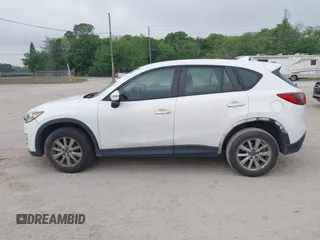 2016 Mazda CX-5 Sport with VIN JM3KE2BY1G0875484, listed as a IAAI auction lot 41838122 with 166,986 mi miles. Bid and sale history available at carsss.com. Image 14.