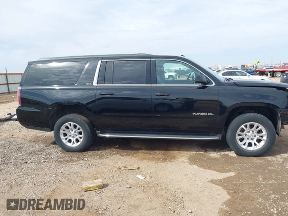 2018 GMC Yukon XL SLT with VIN 1GKS1GKC3JR223544, listed as a IAAI auction lot 41822836 with 164,430 mi miles and . Bid and sale history available at carsss.com. Image 14.