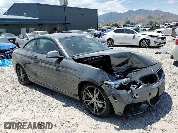 2015 BMW 2 Series M235i with VIN WBA1J7C55FV253647, listed as a Copart auction lot 60231395 with 57,639 mi miles and Salvage title. Bid and sale history available at DreamBid. Image 13.