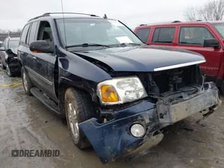 2006 GMC Envoy SLE with VIN 1GKDT13S862329493, listed as a IAAI auction lot 41513303 with 118,355 mi miles. Bid and sale history available at carsss.com. Image 1.