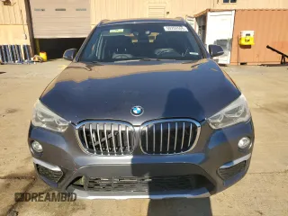 2016 BMW X1 xDrive28i z VIN WBXHT3Z30G4A47563, wystawiony jako Copart lot #50252555 z przebiegiem 99 975 mil mil oraz Szkoda całkowita • Salvage title. Historia ofert i sprzedaży dostępna na DreamBid. Obrazek 5.