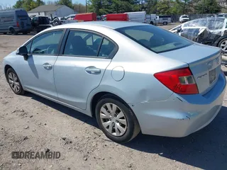 2012 Honda Civic Sdn LX with VIN 2HGFB2F53CH518723, listed as a IAAI auction lot 41995943 with 204,984 mi miles. Bid and sale history available at carsss.com. Image 3.