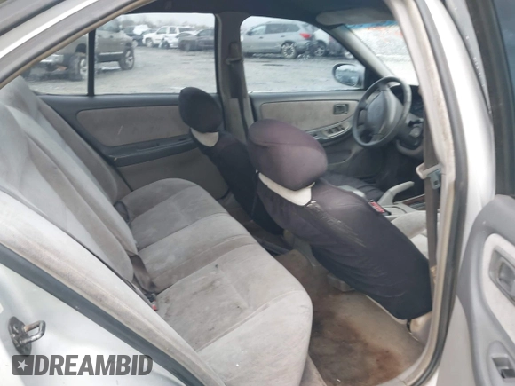 1999 Nissan Altima XE with VIN 1N4DL01D5XC180276, listed as a IAAI auction lot 41584645 with 248,376 mi miles. Bid and sale history available at carsss.com. Image 8.