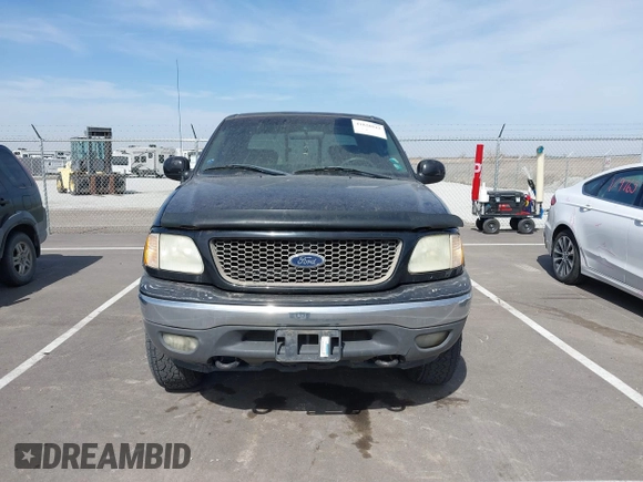 2003 Ford F-150 XLT with VIN 1FTRW08L83KA14760, listed as a IAAI auction lot 41820943 with 215,130 mi miles. Bid and sale history available at carsss.com. Image 12.