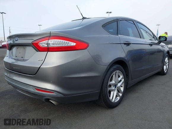 2013 Ford Fusion SE with VIN 3FA6P0H7XDR144223, listed as a IAAI auction lot 42465690 with 110,495 mi miles and . Bid and sale history available at DreamBid. Image 4.