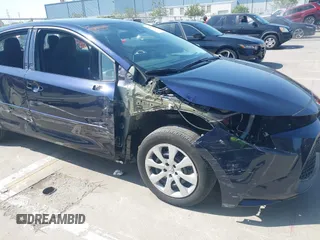 2020 Toyota Corolla LE with VIN 5YFEPRAE5LP145142, listed as a IAAI auction lot 42153289 with 35,010 mi miles and . Bid and sale history available at DreamBid. Image 6.