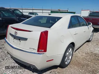 2008 Cadillac CTS AWD with VIN 1G6DG577X80139631, listed as a IAAI auction lot 41813311 with 208,723 mi miles and . Bid and sale history available at carsss.com. Image 4.